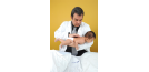 Male osteopath and baby