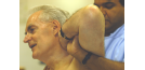 Male osteopath and middle aged man - back 2