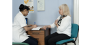Female osteopath with elderly woman 5