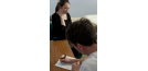 Male osteopath consultation with pregnant woman