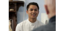 Male osteopath with elderly man 3