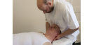 Male osteopath and middle aged man