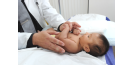 Male osteopath and baby 2