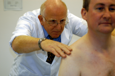 Male osteopath with male - posture
