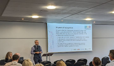 Matthew Redford presenting at Convention 2023 30 years of recognition slide