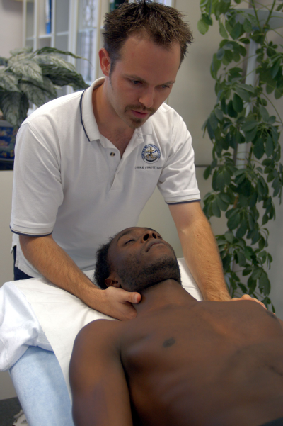 Male osteopath and male patient - head and neck